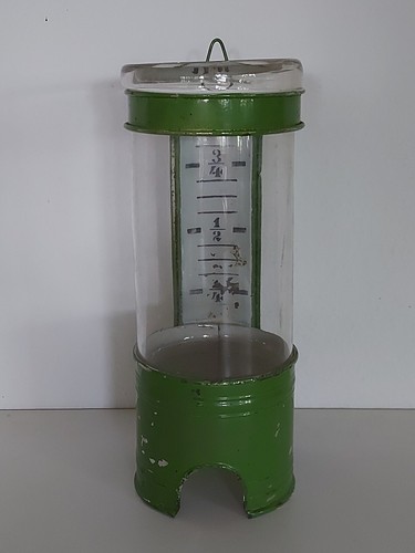 Dekorativer antiker irrigator - antiker,